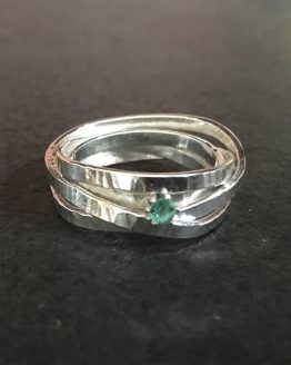 hammered spiral ring with emerald