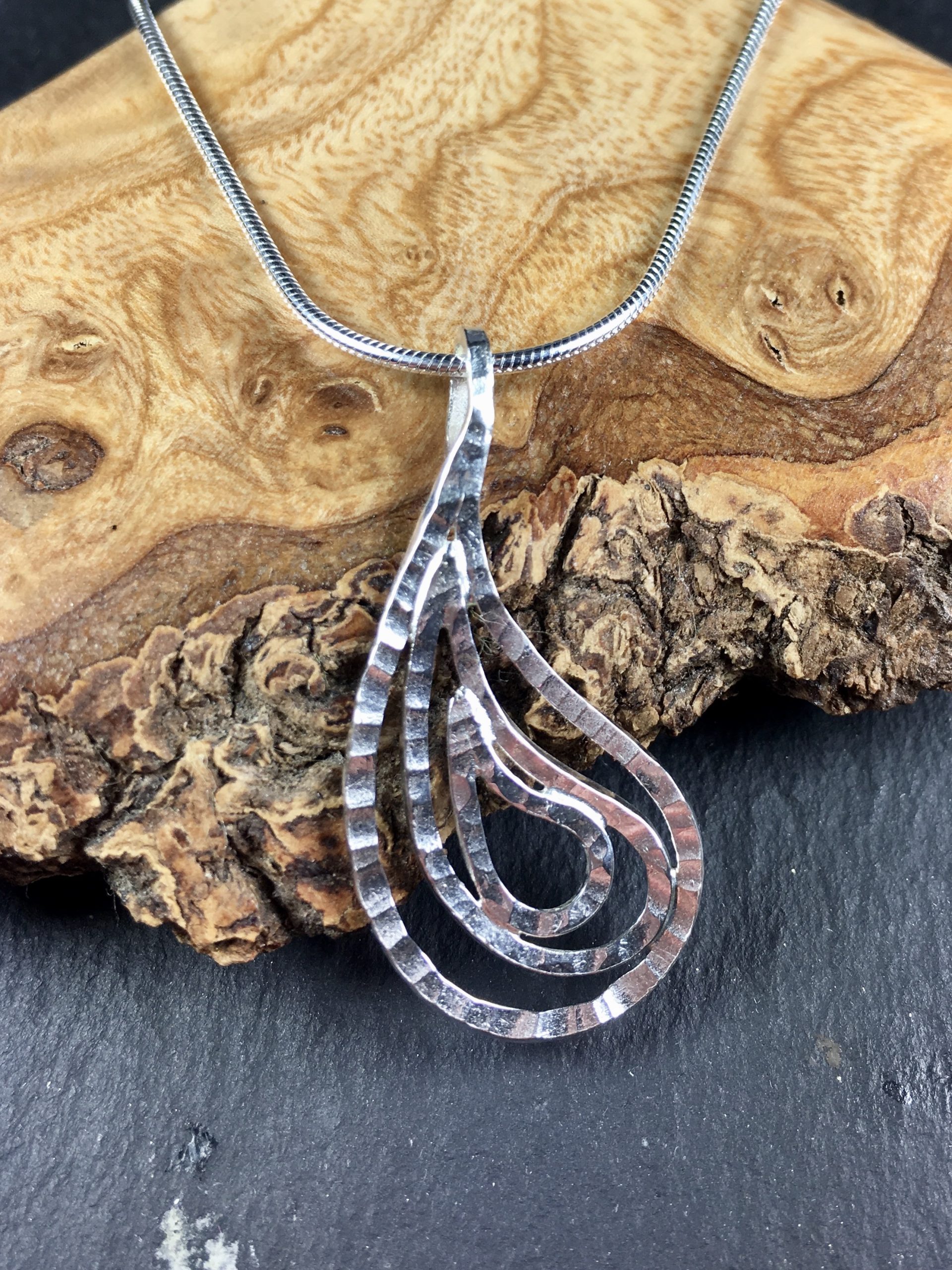 Hammered paisley pendant