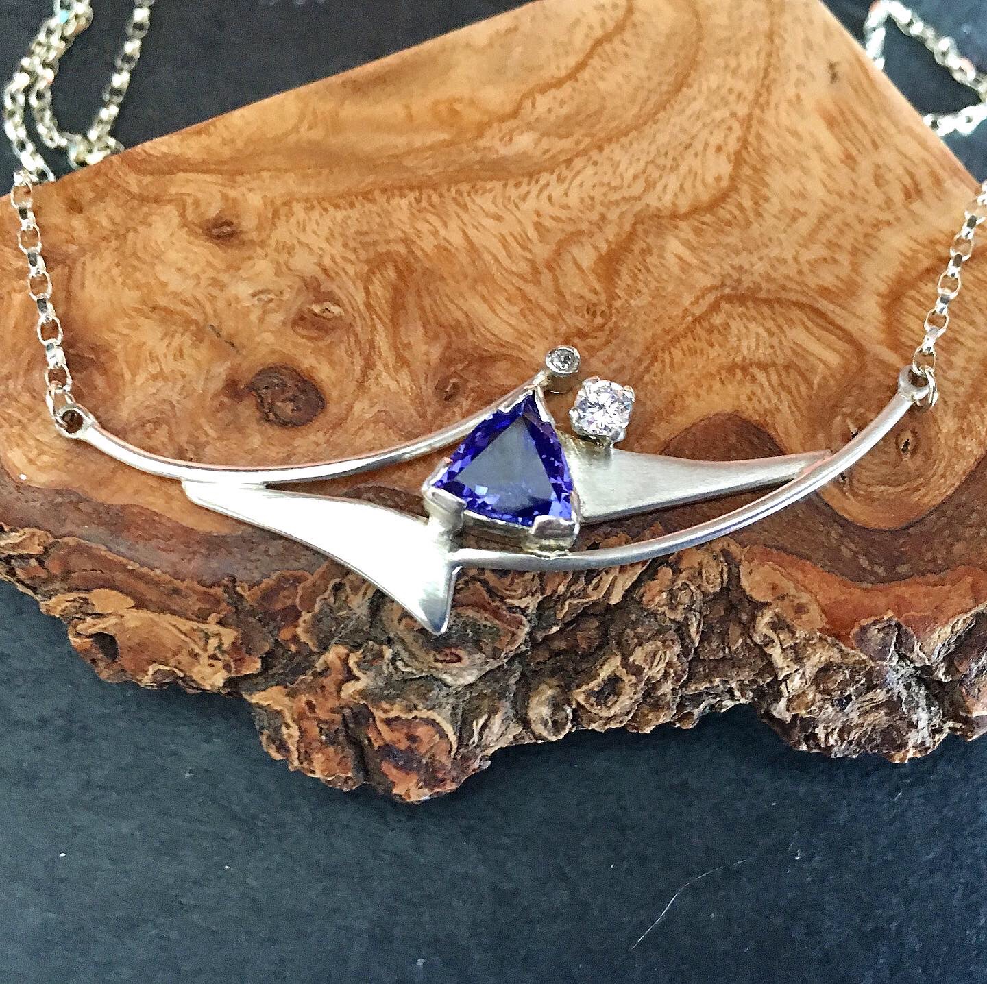 White gold tanzanite and diamond necklace