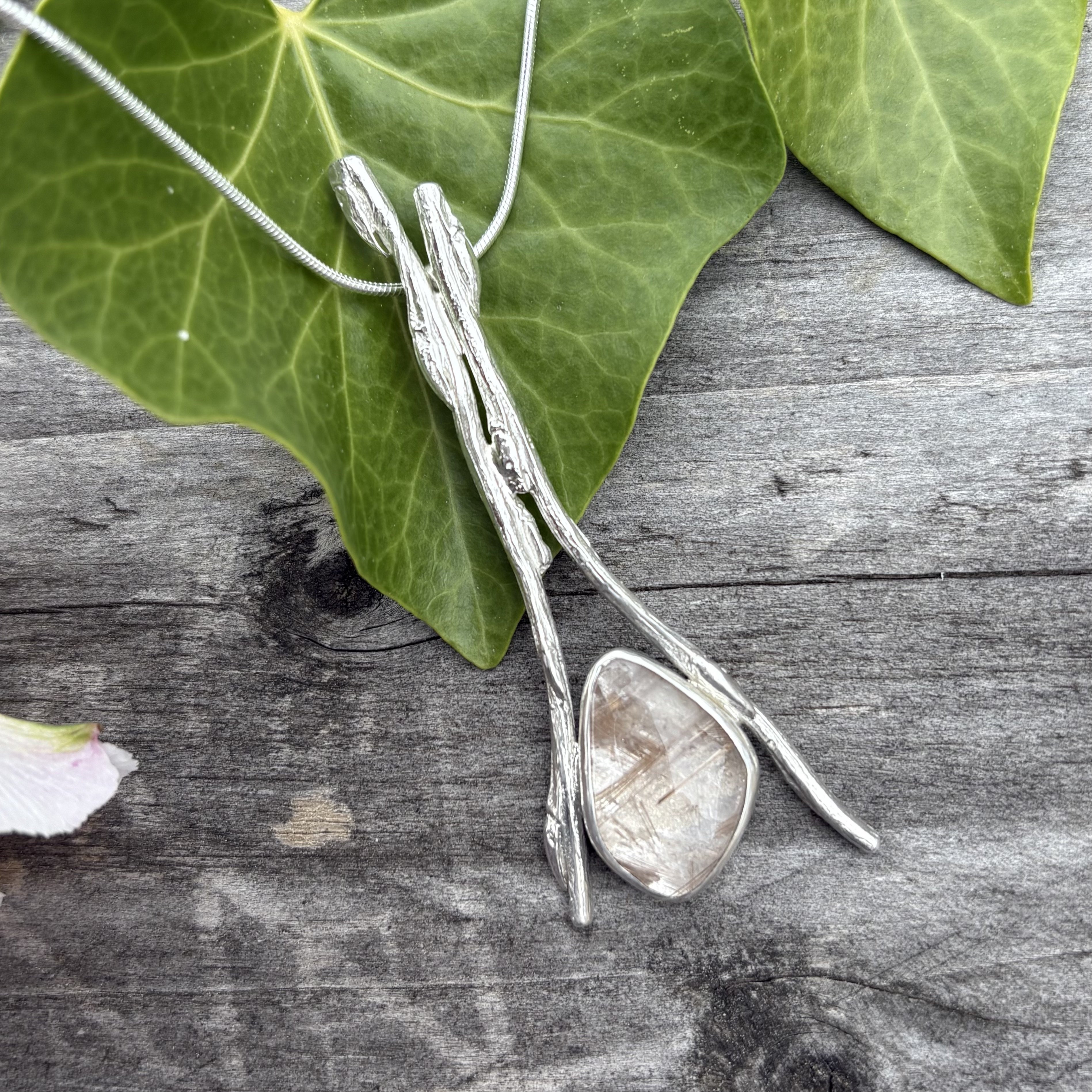 Cast willow pendant with rutilated quartz