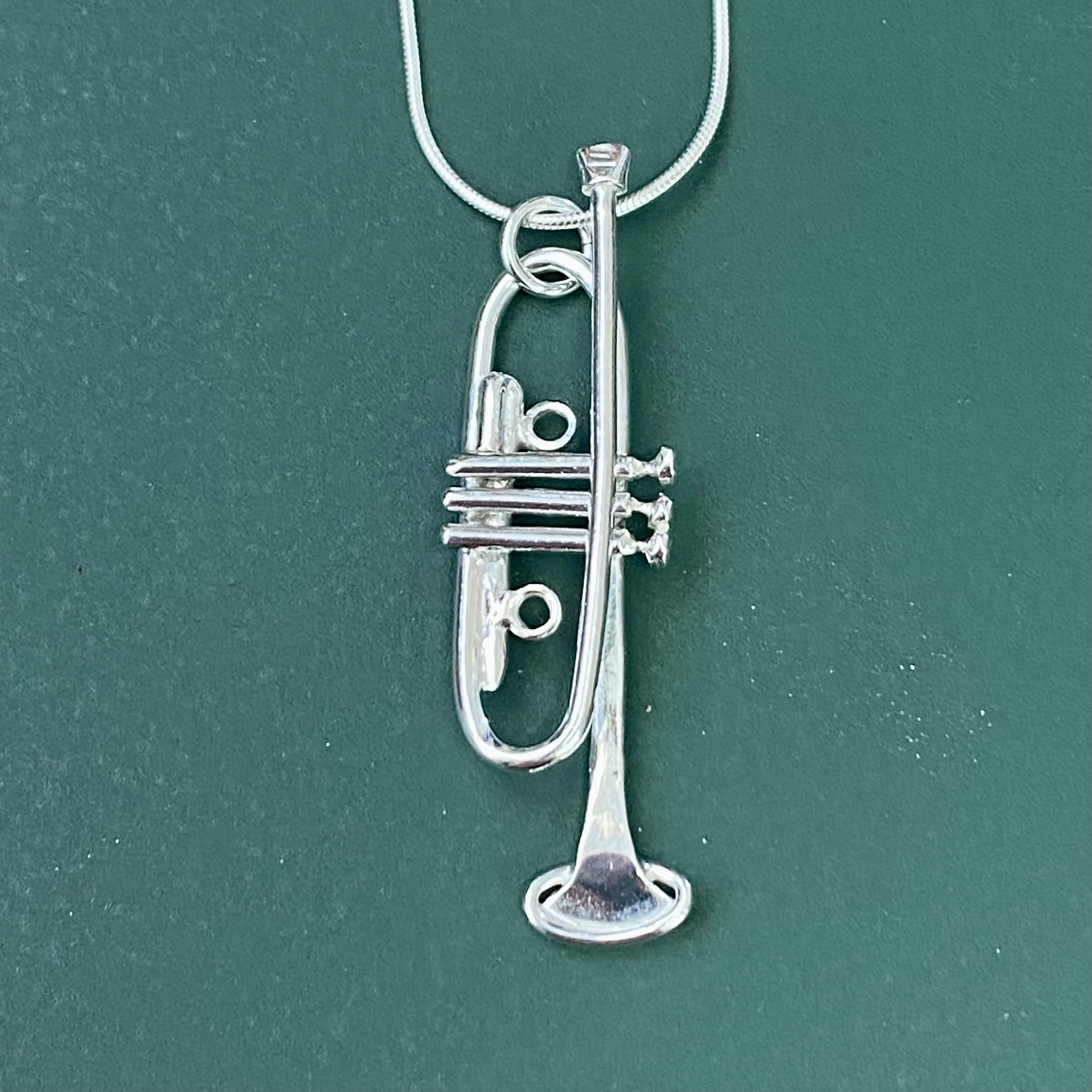 Silver trumpet pendant