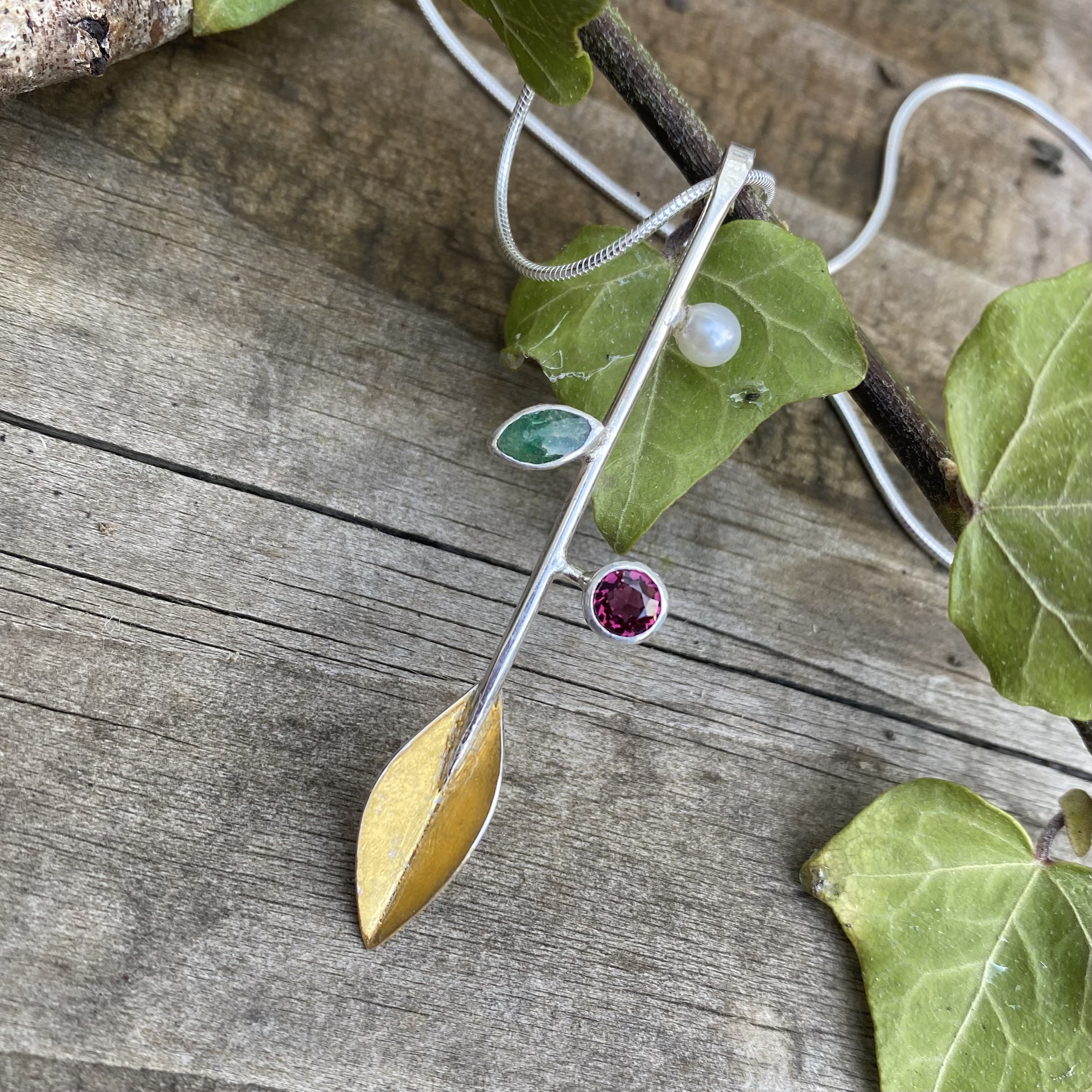 Botanics stem pendant with emerald, rhodolite & pearl