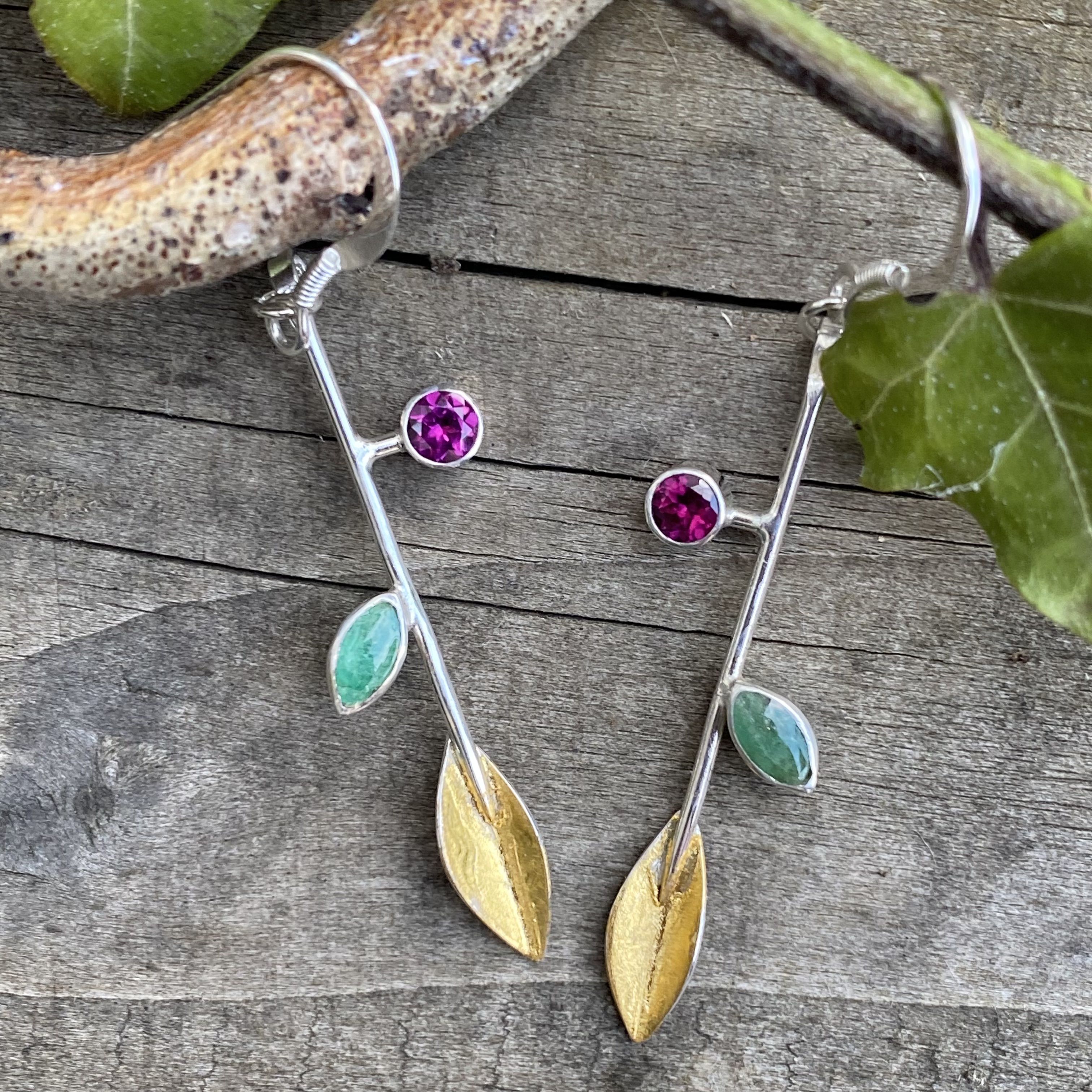 Botanics stem earrings with emerald & rhodolite