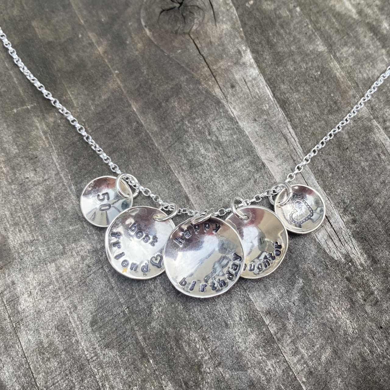 stamped discs pendant